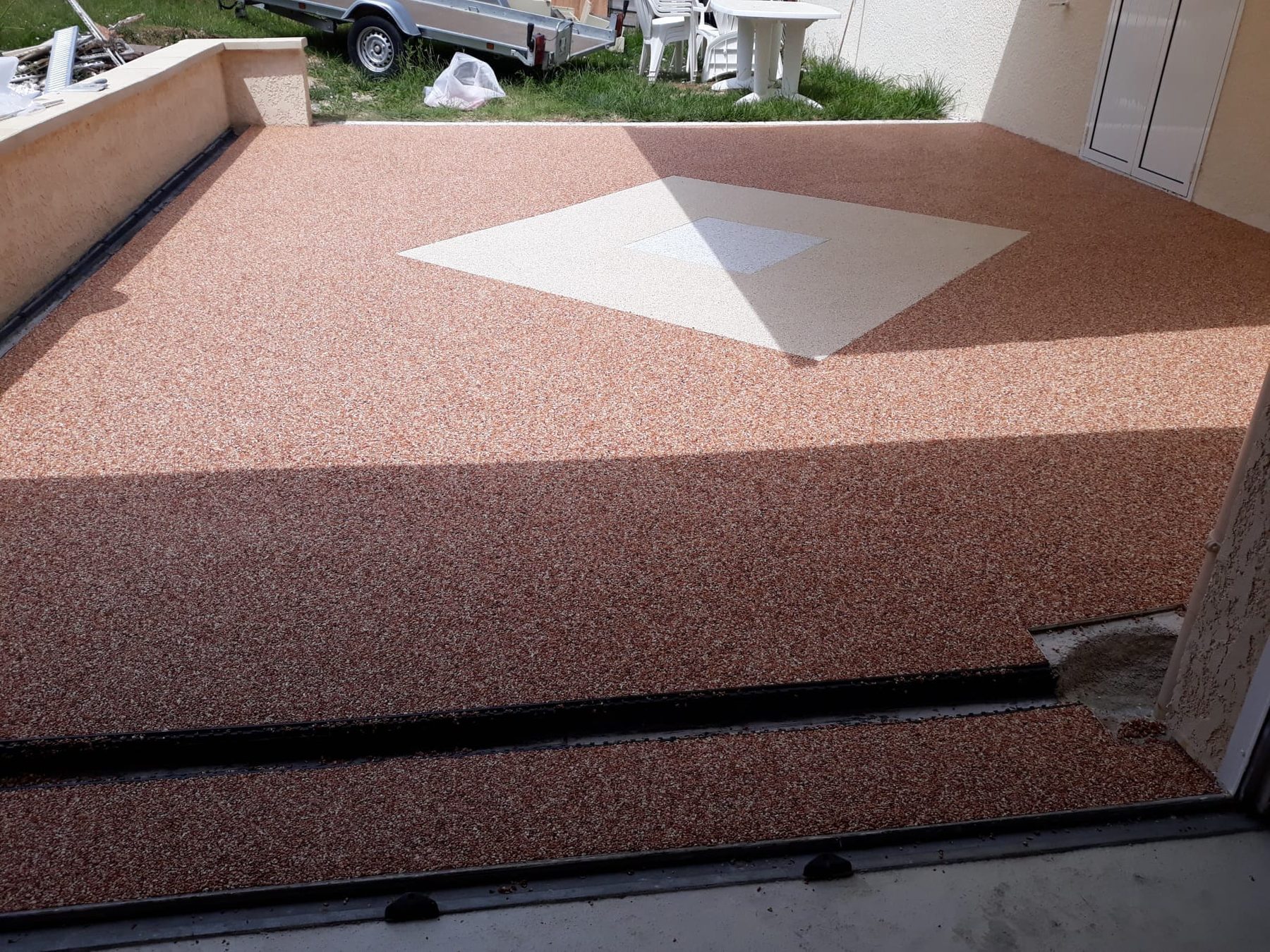 Moquette de pierre terrasse rouge
